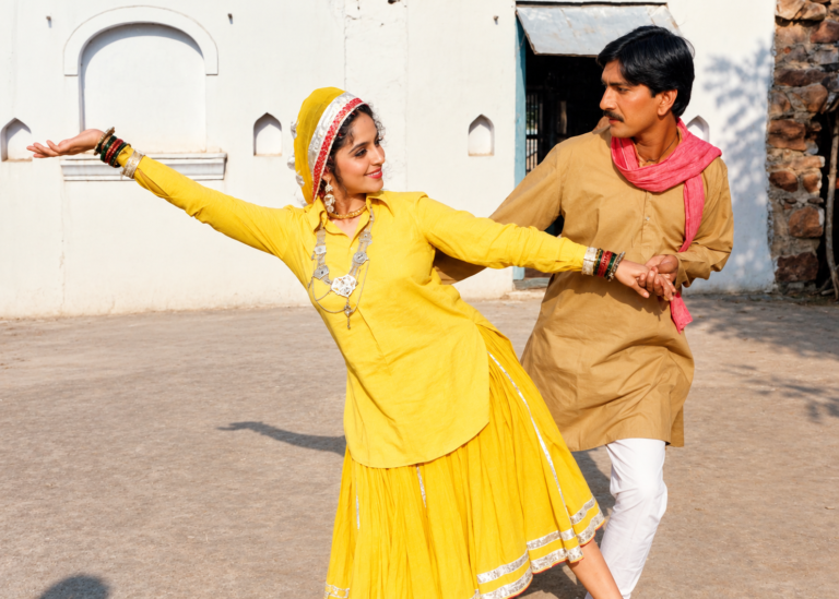 Bollywood dance in a sunlit courtyard